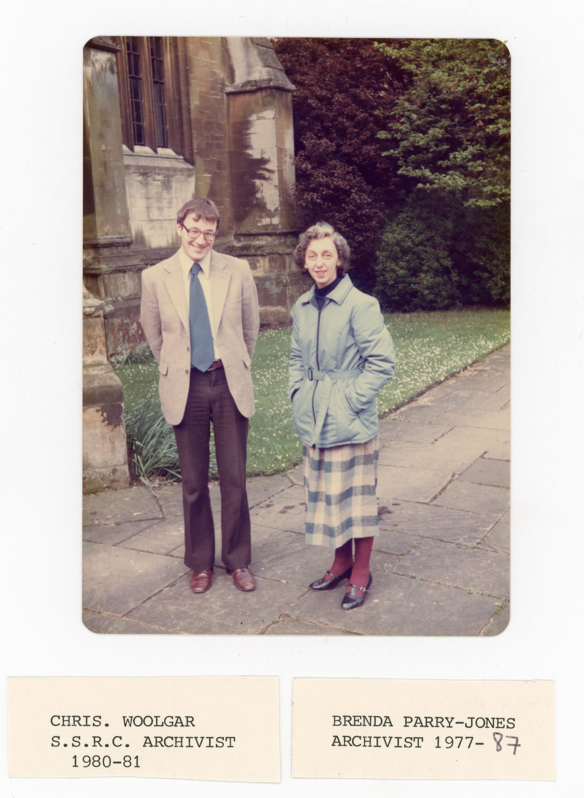 Colour photograph of Magdalen College Archivist Brenda Parry-Jones and Project Archivist Chris Woolgar, circa 1981, from Library and Archives photograph album.